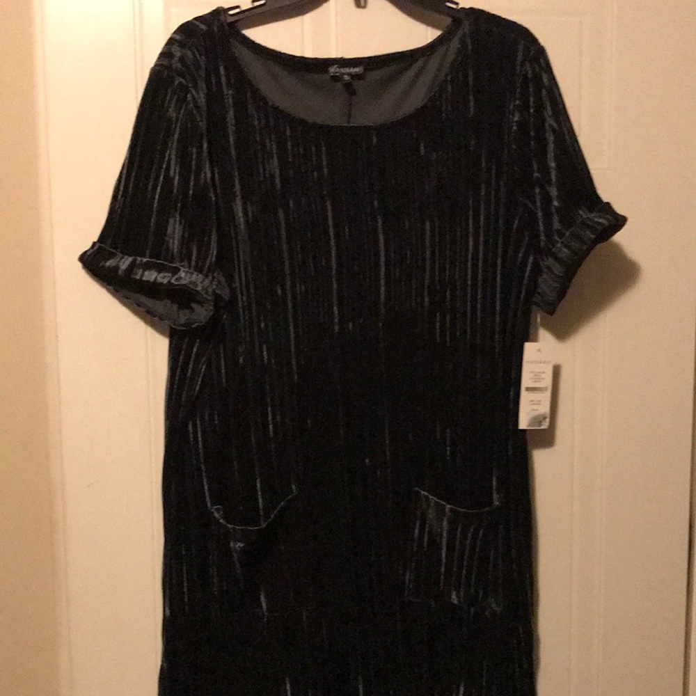Cute black mini dress new with tags.